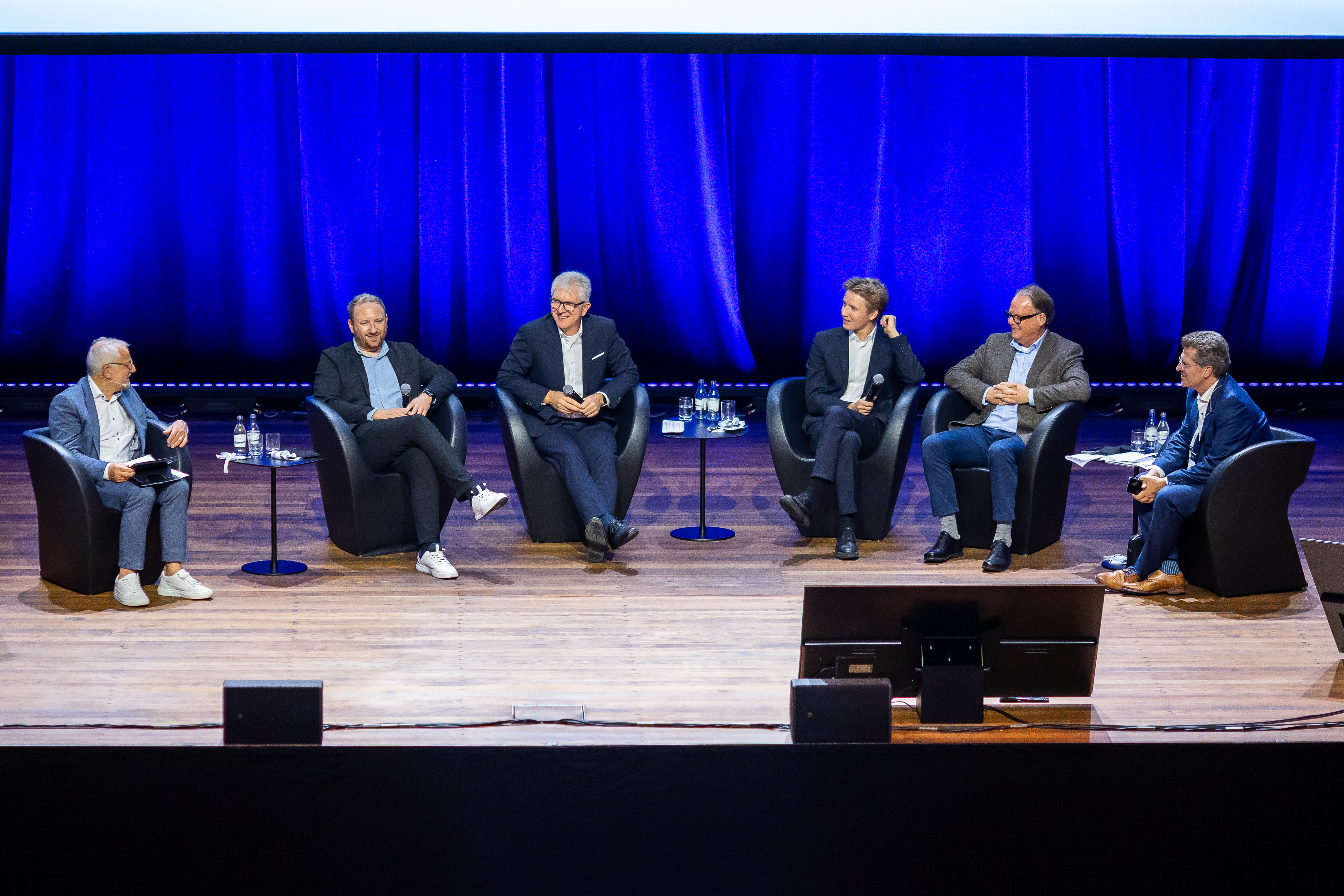Group photo of Dr. Sabine Klauke, Dr. Holger Klein, Shunichi Inamijima, and Ruiping Wang at the Opening Plenary Session 2024.